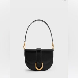 Elegant Black Charles & Keith Gabine Leather Saddle Bag